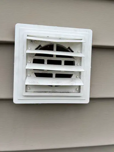 The same dryer vent after cleaning, clear through to the termination