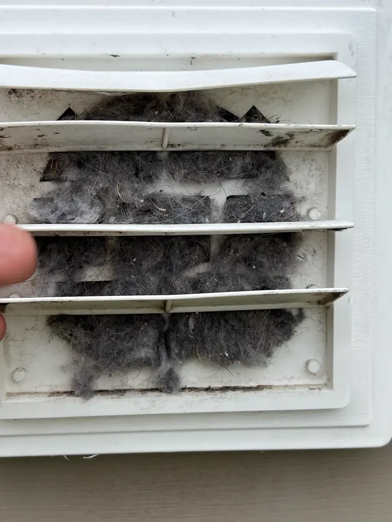 Dryer vent packed with lint before cleaning