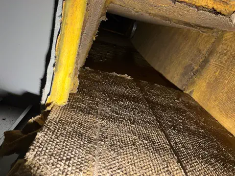Interior of residential ductwork being inspected